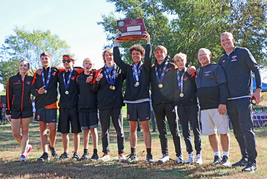 The Fort Calhoun boys cross-country team won a Class C state title Friday during the NSAA State Championships at Kearney Country Club. Pictured are coach Rebecca McMahon, from left, Lawson Tjardes, Johnathon Schwarte, Gage Nixon, Lance Olberding, Jacob Rupp, Ely Olberding, Travis Skelton, coahc Jim Meyer and coach Kyle McMahon.