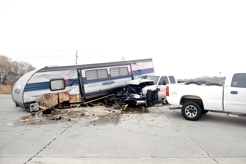 A pickup truck and a camper were heavily damaged after a collision along state Highway 133 near Todd Drive on Wednesday morning.