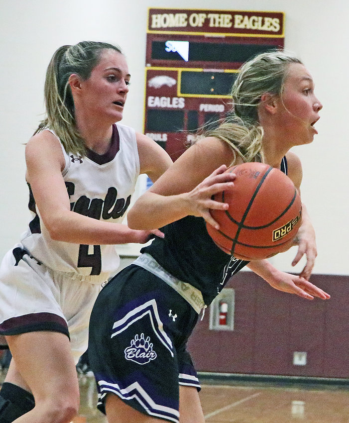 Blair sophomore Leah Chance, right, drives while defended by Keelianne Green on Monday at Arlington High School.