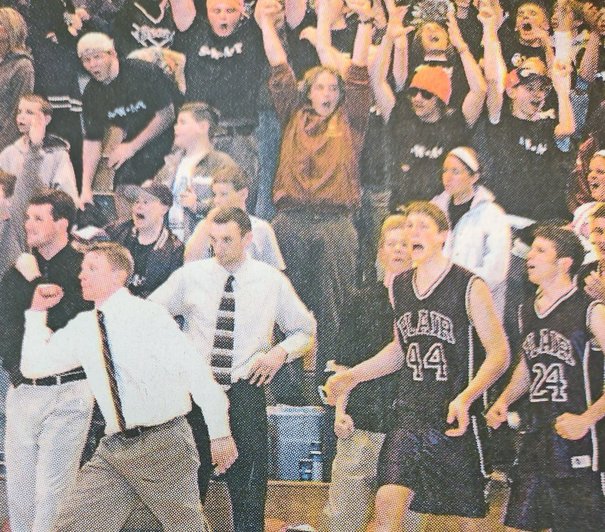 Blair coaches, players and supporters celebrate during the Bears' 2004 district finals win against Elkhorn at Fremont High School.