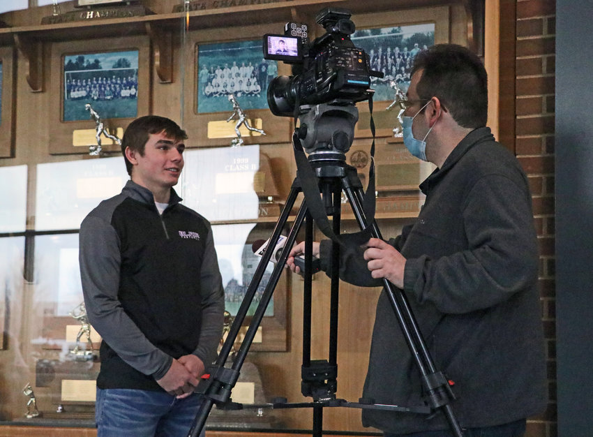 Blair High School senior Kip Tupa is interviewed by Fox 42's Paul Gutierrez on Wednesday after earning the 2021 Building Omaha Thursday Night Lights Scholar Athlete of the Year scholarship.