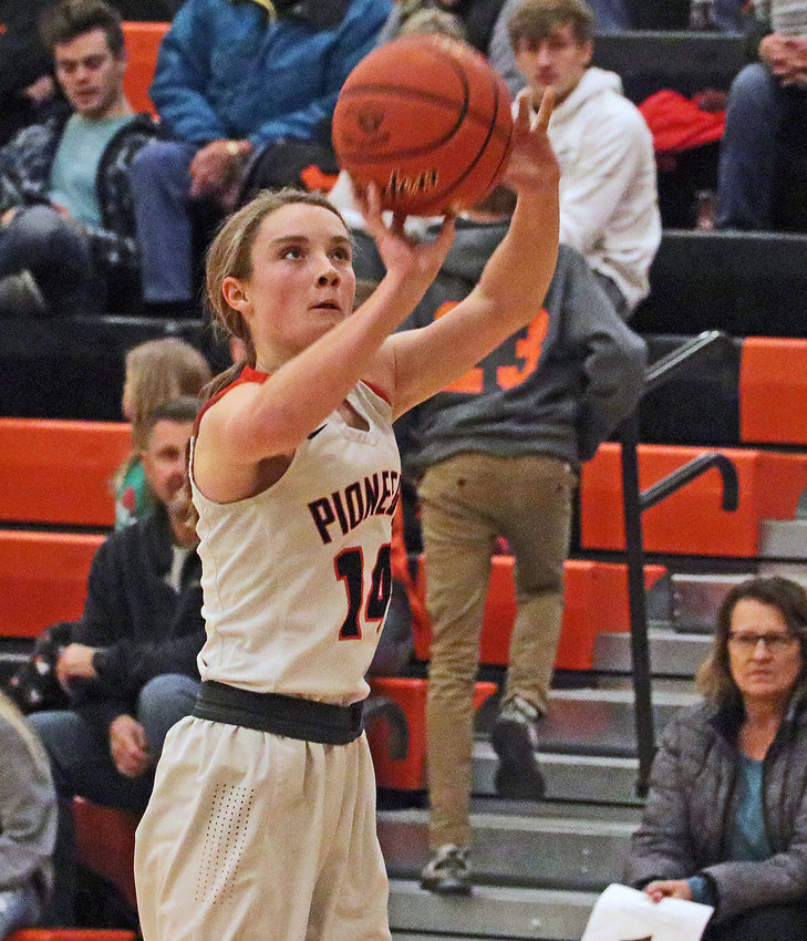Pioneers freshman Kaylee Taylor fires a 3-pointer Monday at Fort Calhoun High School.