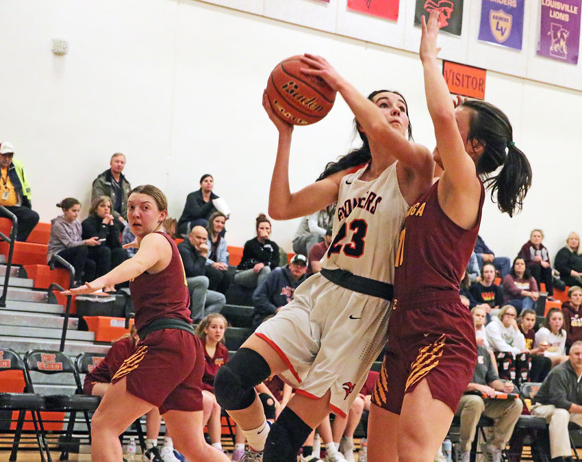 Pioneers sophomore Bria Bench goes up for a shot against Conestoga on Monday at Fort Calhoun High School.