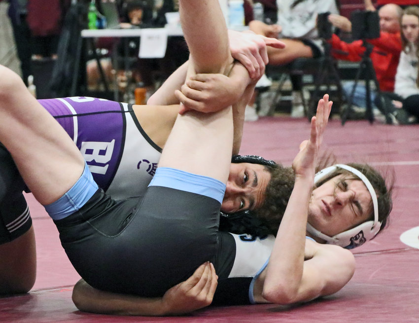 Blair 126-pounder Tyson Brown, top, takes Carter Reichenberg of Elkhorn North to the mat Friday at Waverly High School.