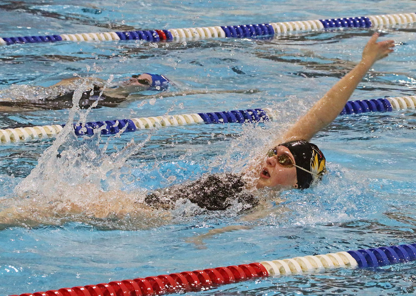 Blair freshman Jane Busboom competes in the pool Tuesday at the Dillon Family Aquatics Center in Fremont.