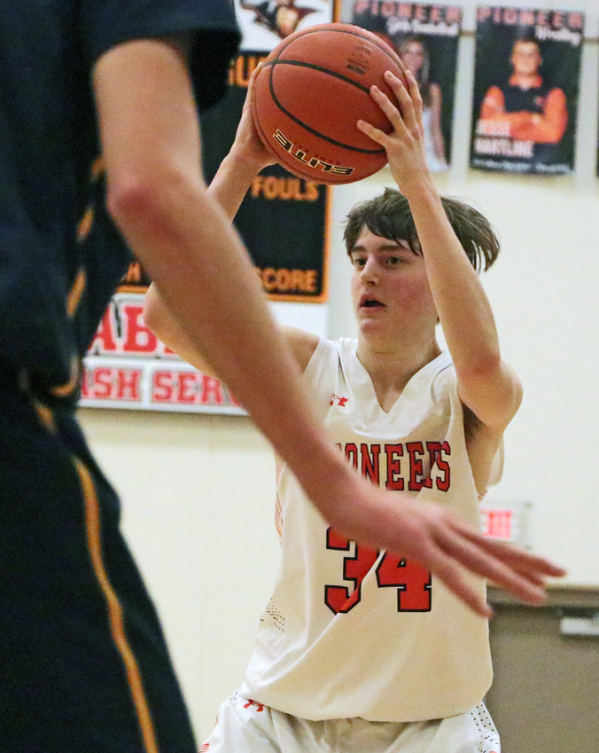 Pioneer Zach Nelson looks for a passing lane Tuesday at Fort Calhoun High School.