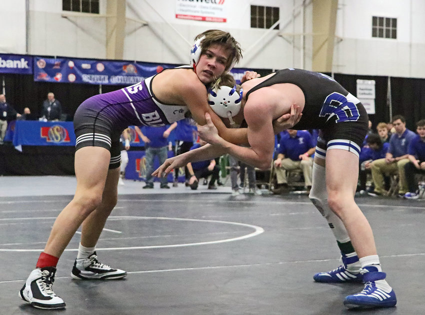 Blair 106-pounder Hudson Loges, left, competes agaisnt Bennington's Cadyn Coyle on Saturday at the NSAA Dual Championships in Kearney.