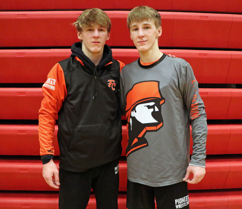 Fort Calhoun brothers Lance, left, and Ely Olberding each qualified for their third NSAA State Wrestling Championships on Saturday during district competition.