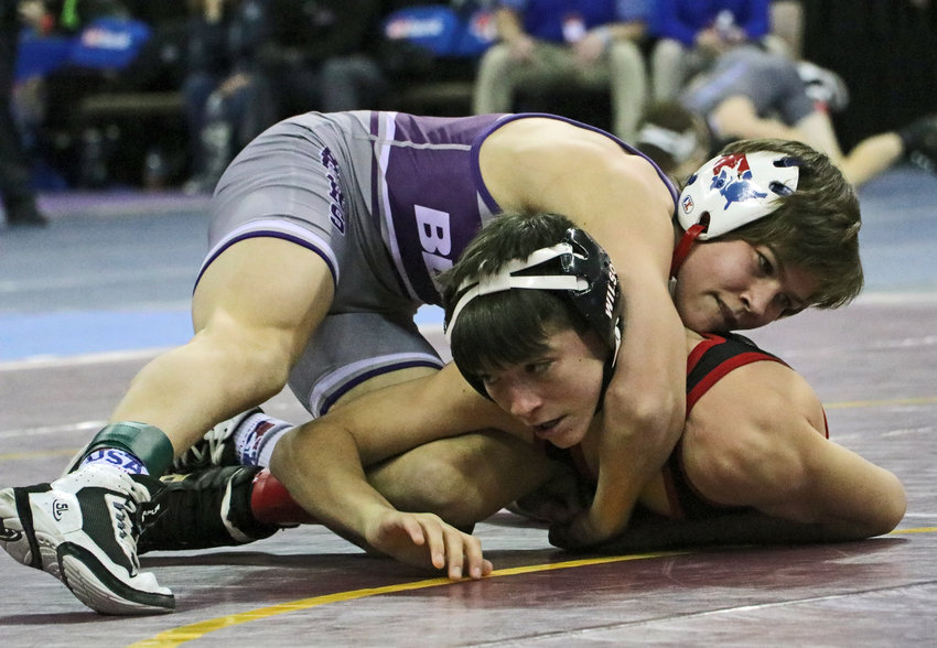 Blair 106-pounder Hudson Loges, top, works to turn Cozad's Aaron Wilson on Thursday during the NSAA State Wrestling Championships in Omaha.