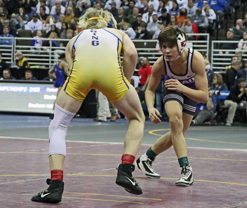 Blair freshman Hudson Loges, right, faces Gering's Ashton Dane on Friday during the NSAA State Wrestling Championships in Omaha.