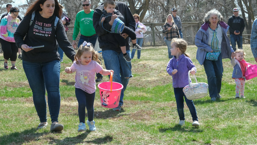 Toddler and kindergarten age kids hunt for eggs at Camp Fontanelle's Easter Egg Hunt April 10.