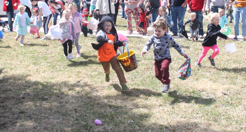 Children zero in on eggs at the Herman Easter Egg Hunt.