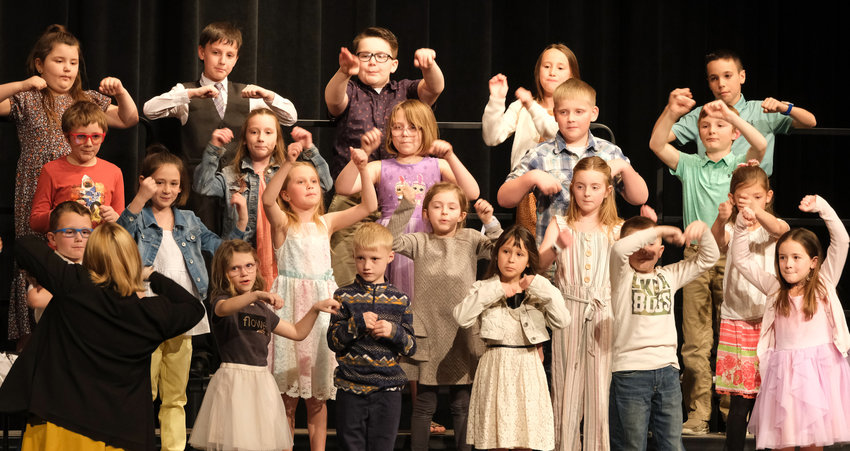 South Primary School second graders put motion in their songs at Spring Sing April 7.