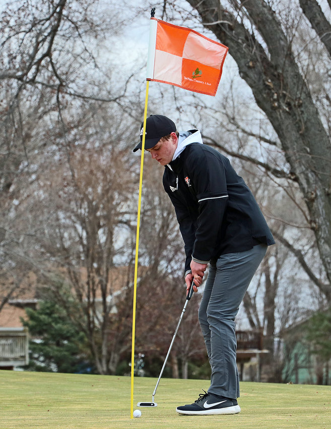 Fort Calhoun's Tyler Eastman putts Wednesday at The Pines in Valley.