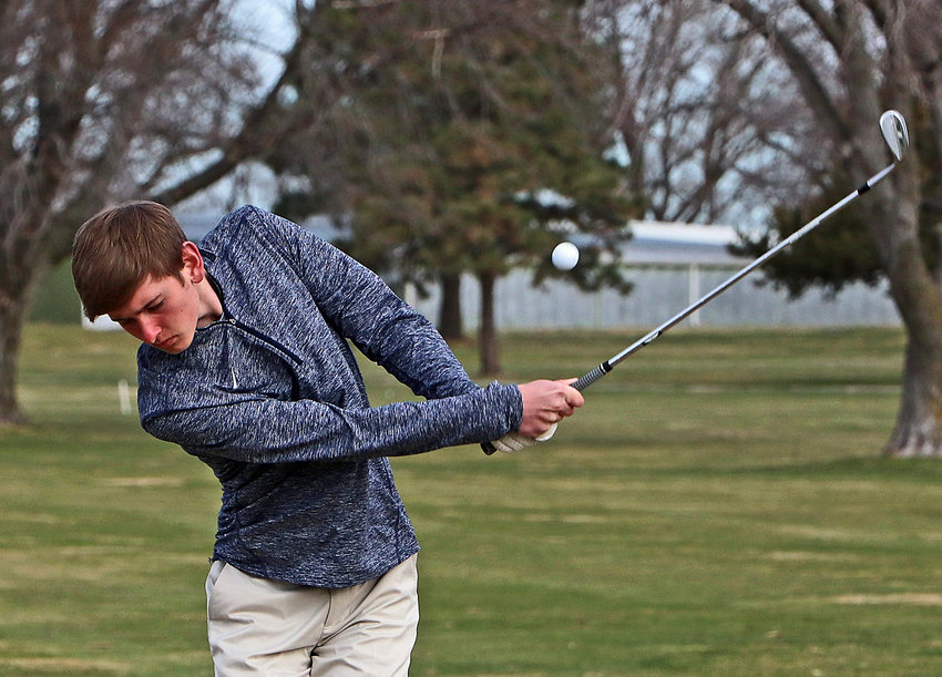 Arlington's Eddie Rosenthal hits the ball in the air Monday at Ashland Golf Club.