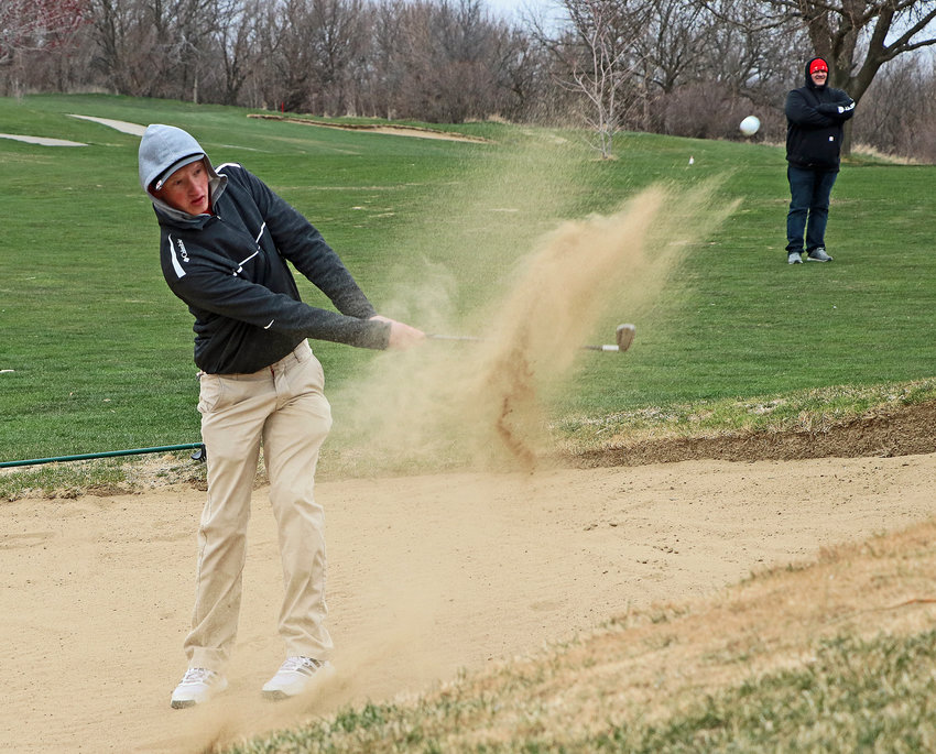Blair's Kalvin Lorenzen cleanly places his ball on the second green from the bunker Tuesday at River Wilds Golf Club.