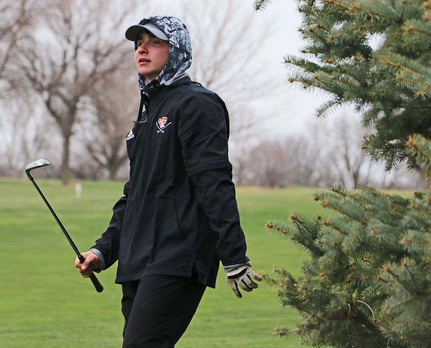 Fort Calhoun's Dylan Boldt watches his shot onto the fairway Tuesday at River Wilds Golf Club.