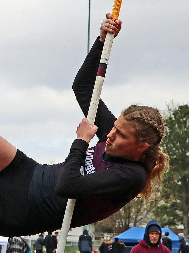 Arlington's Whitney Wollberg competes in the pole vault Tuesday at Yutan High School.