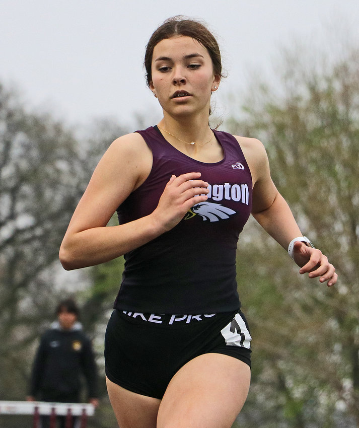 Hannah Goodwater of Arlington runs the 400-meter dash Thursday during her team's meet.