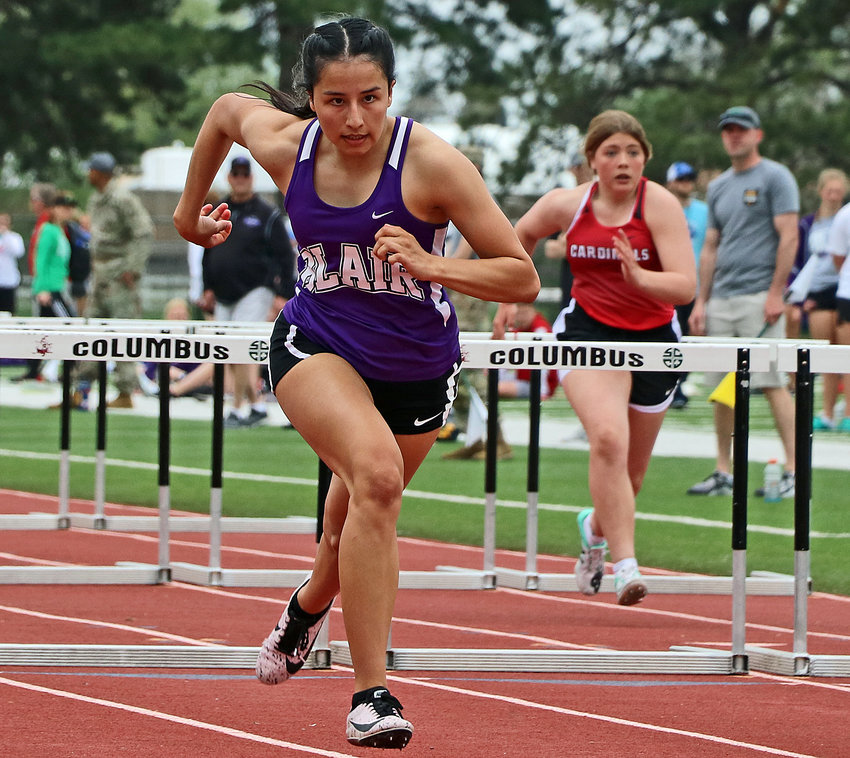 Blair senior Erika Roehrs runs the 100-meter hurdles Tuesday in Columbus.