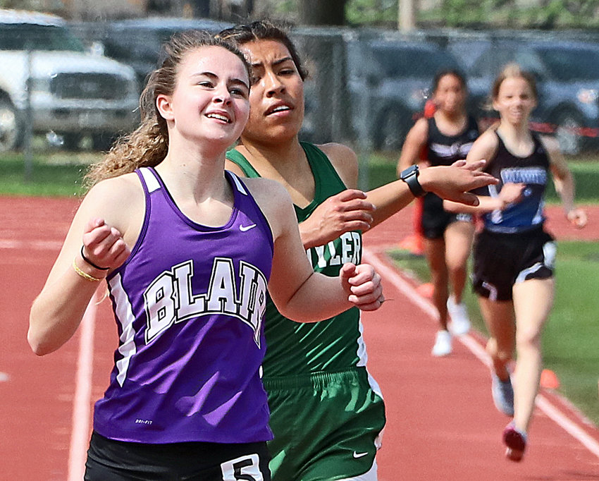 Blair's Allie Czapla, left, reacts to qualifying for state Tuesday in Columbus.