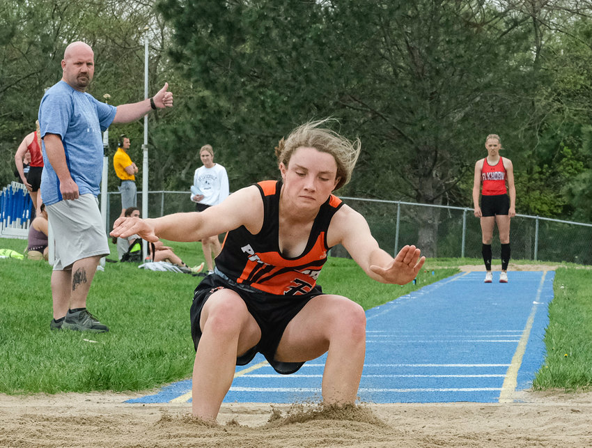 Fort Calhoun's Kaylee Taylor competes in the triple jump Tuesday at Wahoo High School.