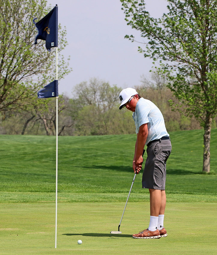Blair's Luke Valasek putts May 11 at River Wilds Golf Club.