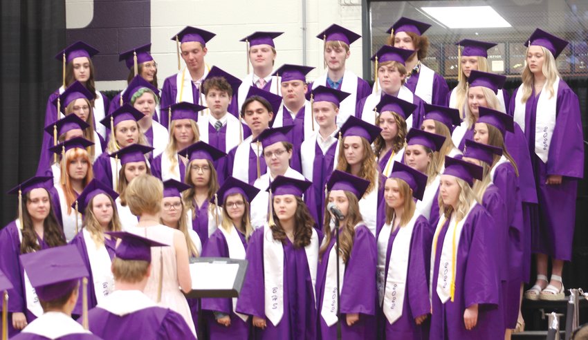 Senior members of the Blair High School choir perform "Bridge Over Troubled Water" at the commencement ceremony.
