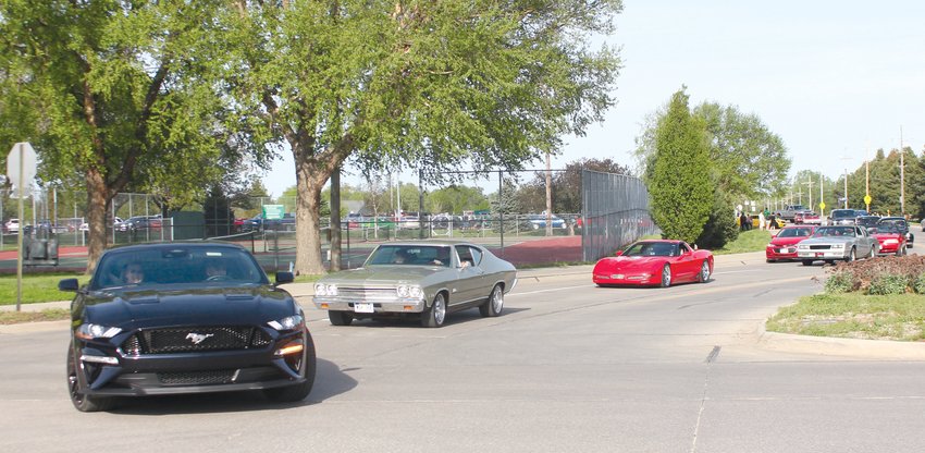 Cars leave the Blair Youth Sports Complex to begin the first Blair Cruise Night of the year.