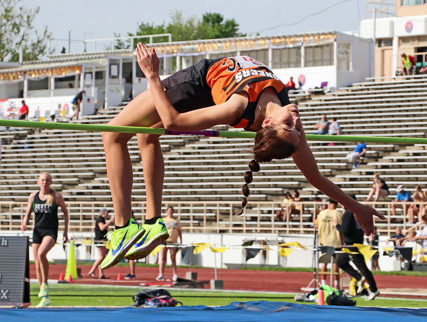 Fort Calhoun's Bria Bench clears the high jump bar Thursday during the NSAA Track & Field State Championships at Omaha Burke Stadium.