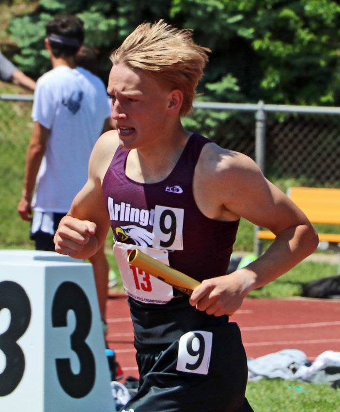 Arlington's Nolan May competes in the 3,200-meter relay Wednesday at Omaha Burke Stadium.