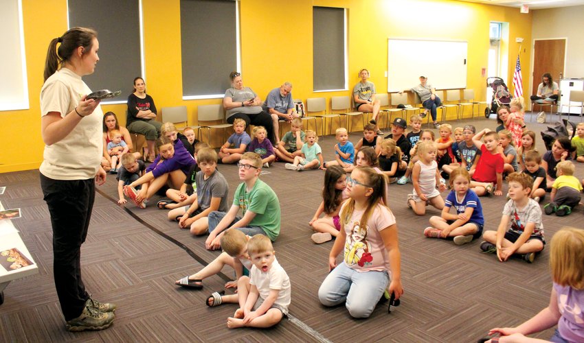 A painted turtle was just one of many guests Papio-Missouri River Natural Resources District natural resource eduator Kaylyn Kelley brought to the Blair Public Library and Technology Center on June 7.