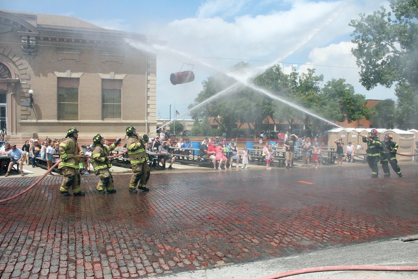 The corporate water fight was held at the South Blair Fire and Rescue station Saturday afternoon following the Gateway to the West Days parade.