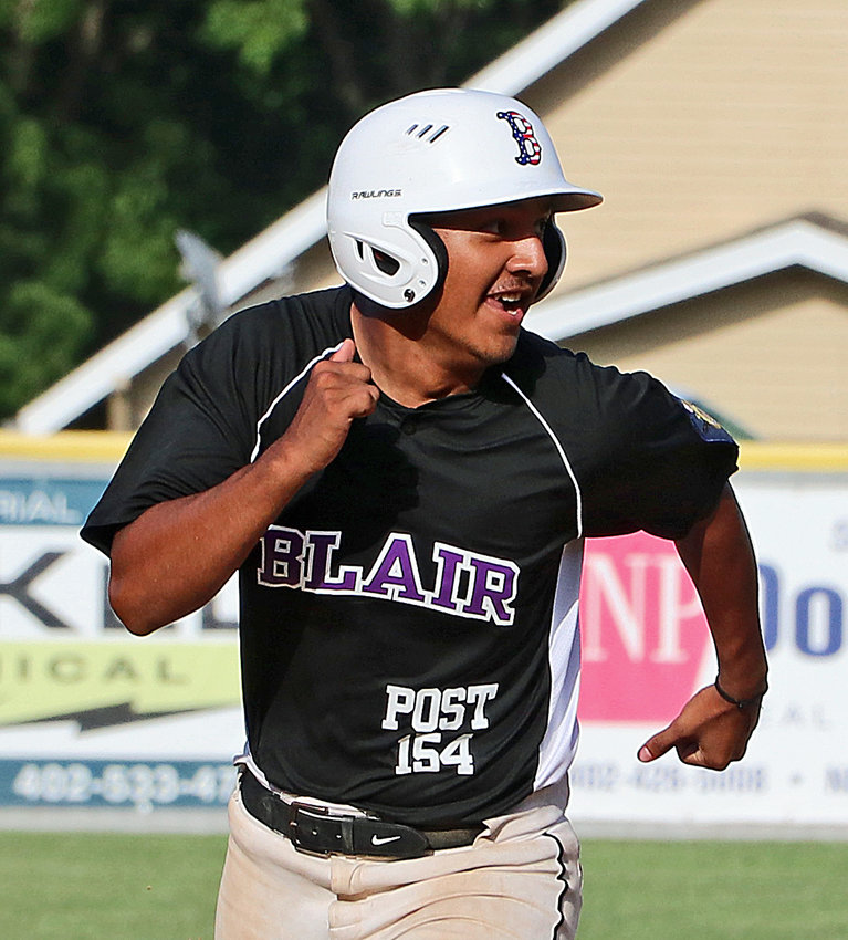 Blair Senior Legion base runner Lee Chavez-Lara races to third base on a passed ball Saturday at Vets Field.