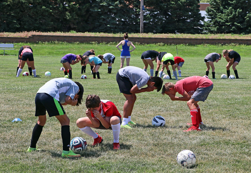 Campers work on their reaction times Tuesday at the Blair Youth Sports Complex.