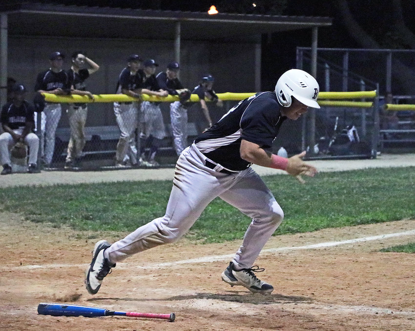 Blair Senior Legion batter Dylan Swanson takes off out of the box on contact June 22 at Vets Field.