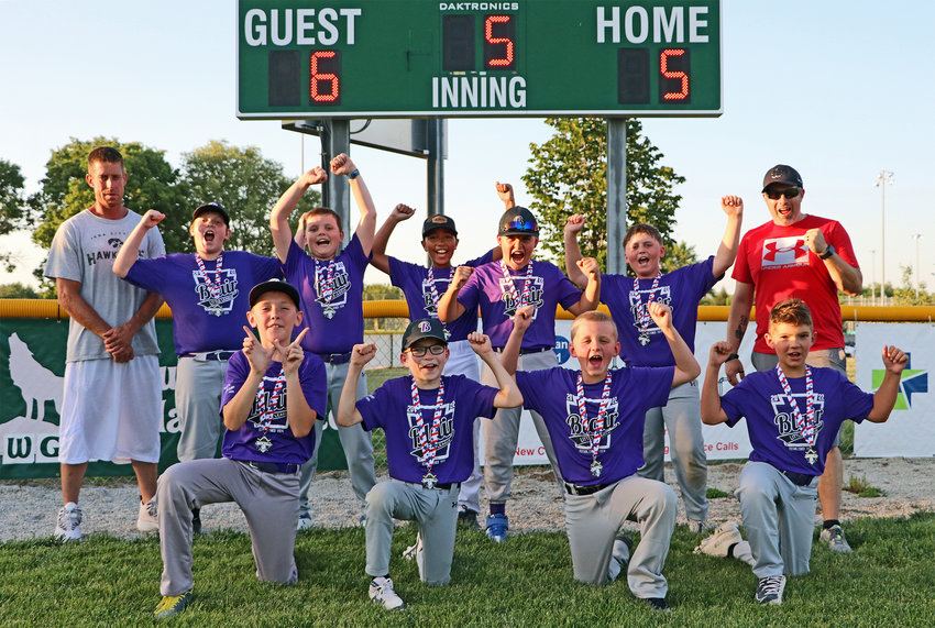 The Minor League champion Rockies pose for a photo Tuesday at Wederquist Field. They are Alex LeGrand, front row from left, Joshua Whitehead, Tyson Salts and Colin Busboom. Second row: Coach Jay Christiansen, Thad Sueverkruepp, Bentley Wolff, Jaxson Socha, Mason Gubbels, Calan Herber and coach Dwain Whitehead. Not pictured: Joey Maslowsky and Riley Stancil.
