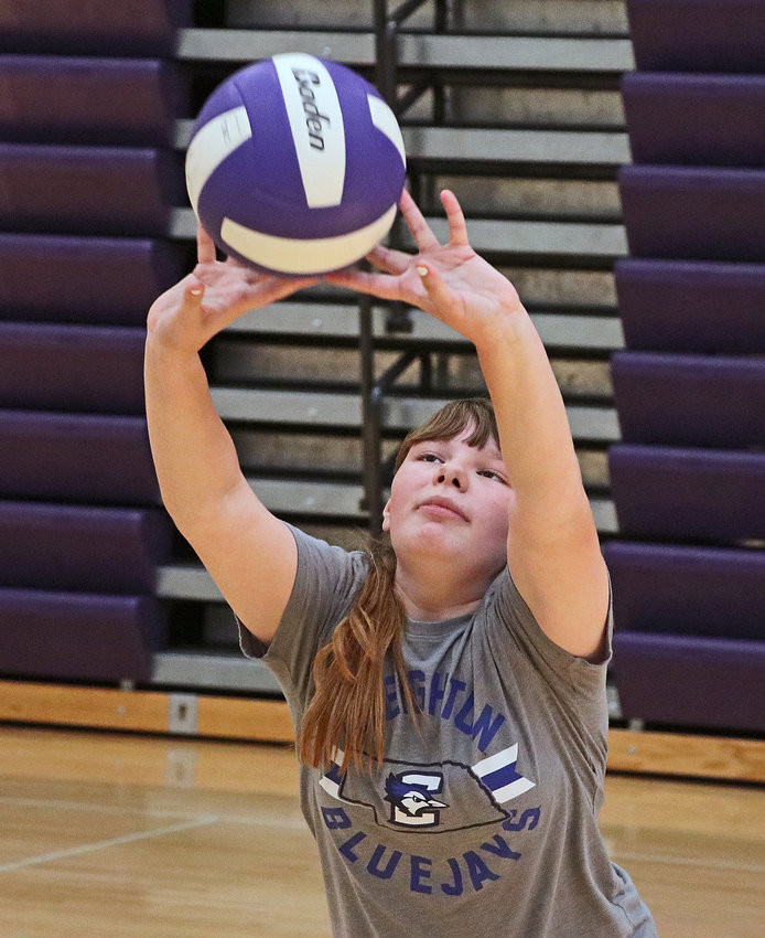 Soon-to-be seventh-grader Sophia Guynan sets the ball Tuesday during the Blair High School volleyball clinic.