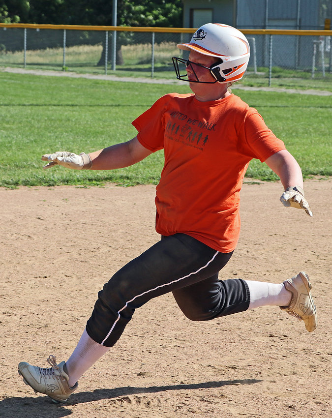 Isabel Wray runs the bases June 29 in Fort Calhoun.