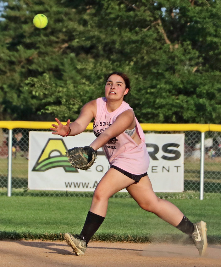 A Division All-Star Jaslyn Raymond tracks down and catches a blooper in the infield June 30 at the Youth Sports Complex.