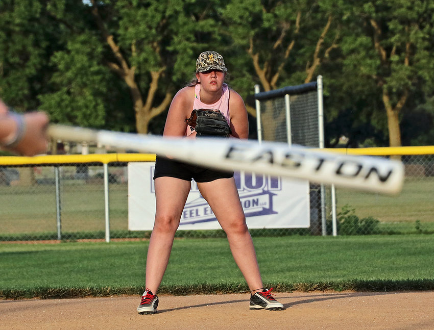 Lizzy Flynn of the A Division All-Stars watches the opposition take a swing from her spot in the field June 30 at the Youth Sports Complex.