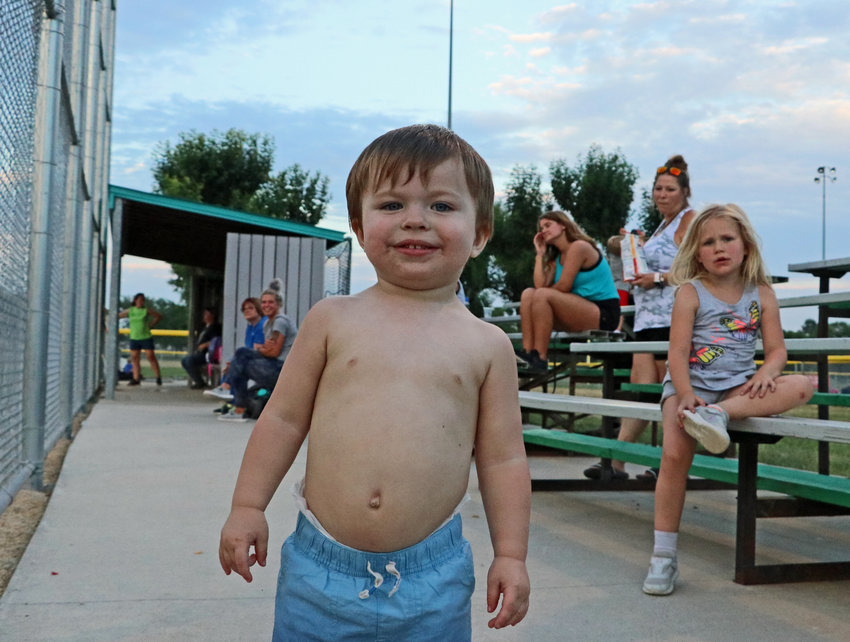 Softball fan Ezra Merksick, 2, attended the June 30 softball games at the Youth Sports Complex, supporting the Jennings Plant Services team.
