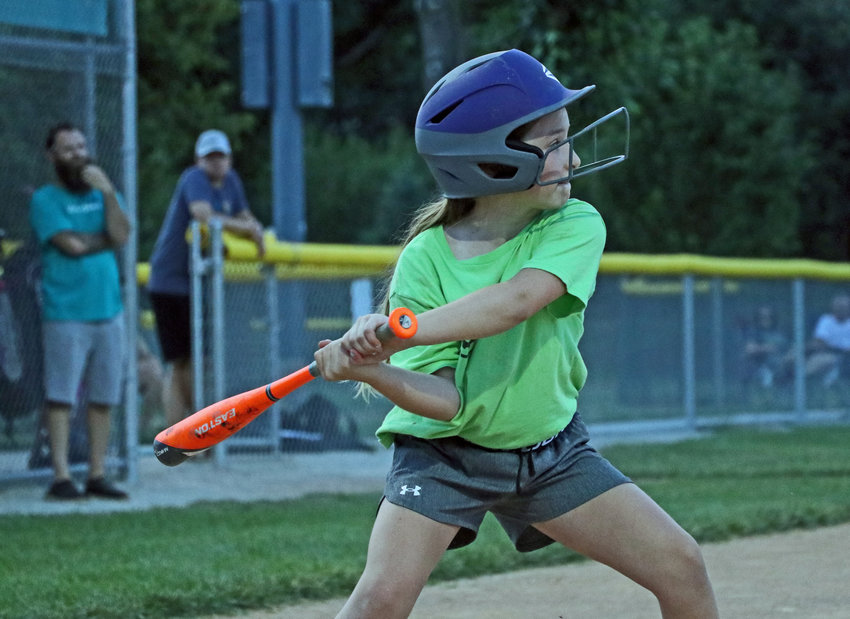 Lillian Tetrick of Jennings Plant Services takes a swing June 30 at the Youth Sports Complex.