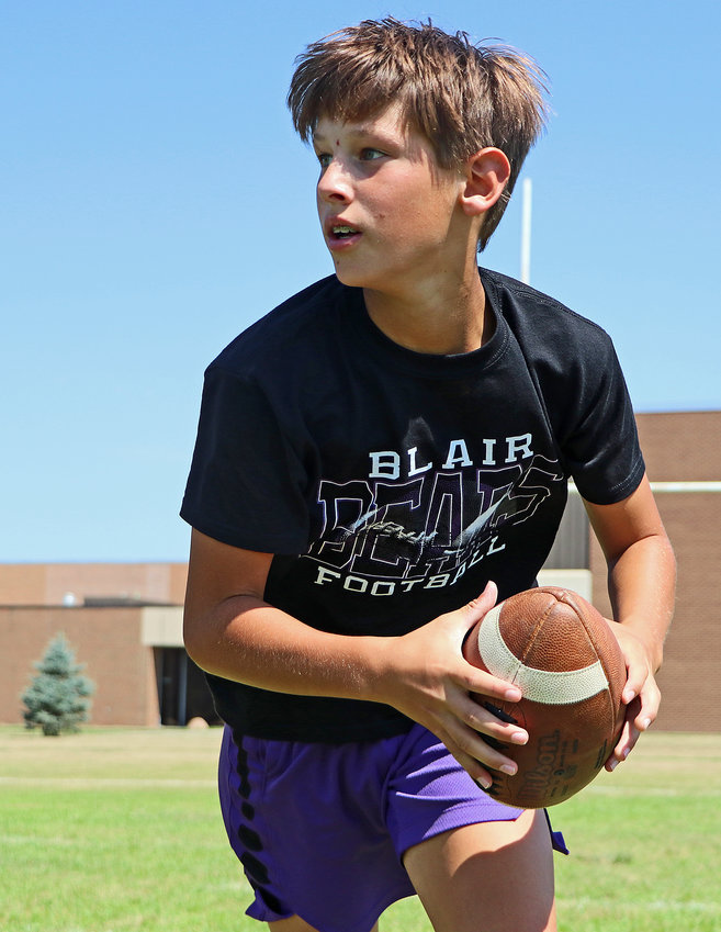Brevin Leggott, 12, races to his next target Tuesday at Blair High School.