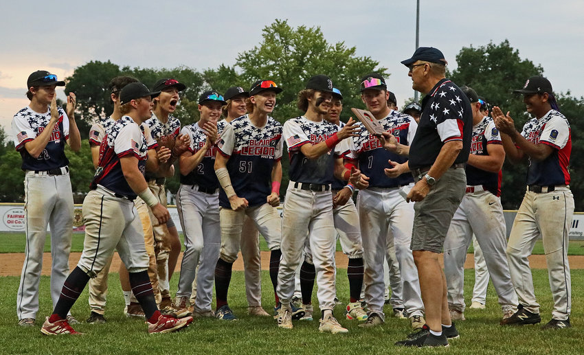 The Blair Senior Legion baseball team accepts its Class B Area 3 Tournament championship plaque Tuesday at Vets Field. The Post 154 Bears topped Elkhorn Training Camp/Mount Michael to win and advance to the state tourney.
