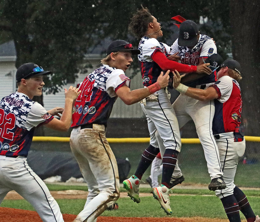 Blair Senior Legion baseball players Tanner JacobSon, from left, Greyson Kay, Ethan Baessler, Lee Chavez-Lara and Dylan Swanson celebrate Tuesday's district title win at Vets Field.
