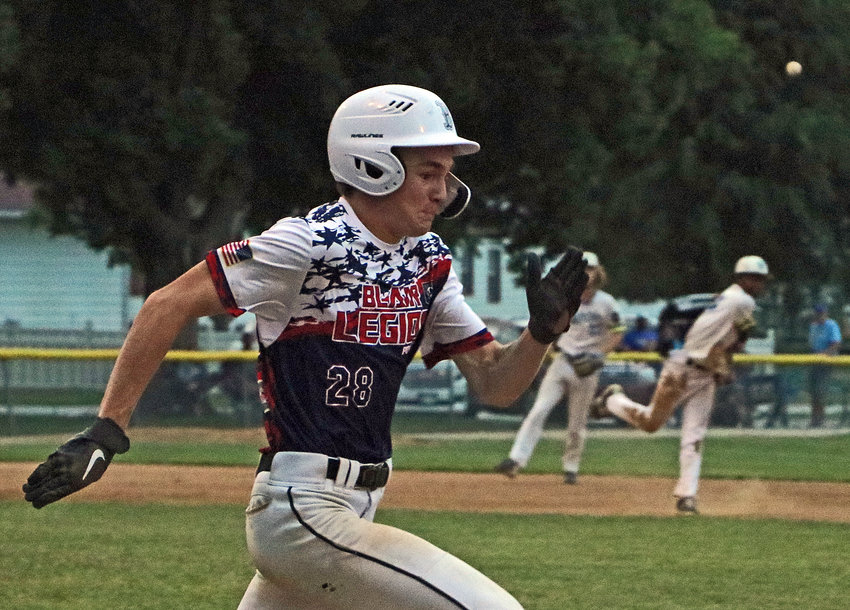 Blair Senior Legion batter Eli Morgan sprints to beat the Waterloo-Valley throw to first base Monday at Vets Field.