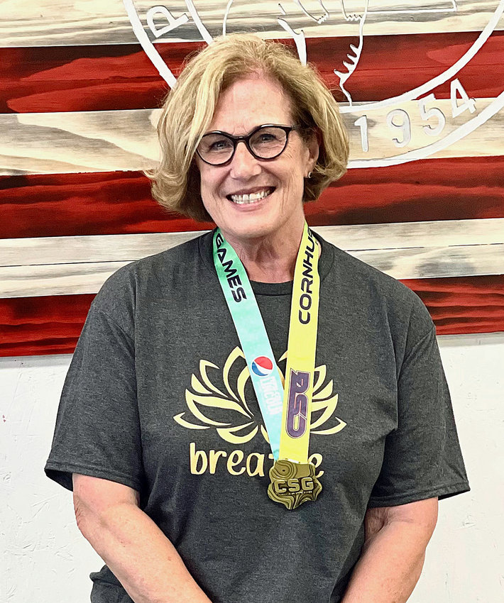 Orion Archery Club's Susan Bensen earned a gold medal in archery during the 2022 Cornhusker State Games.