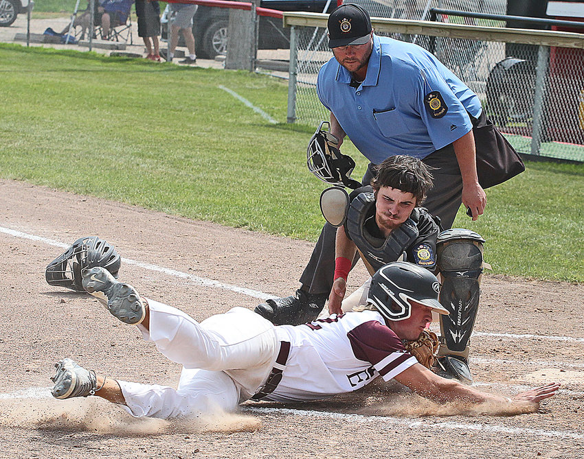 Blair Senior Legion catcher Conner O'Neil tags a Waverly base runner at the plate Tuesday during the Class B state tournament in Broken Bow.