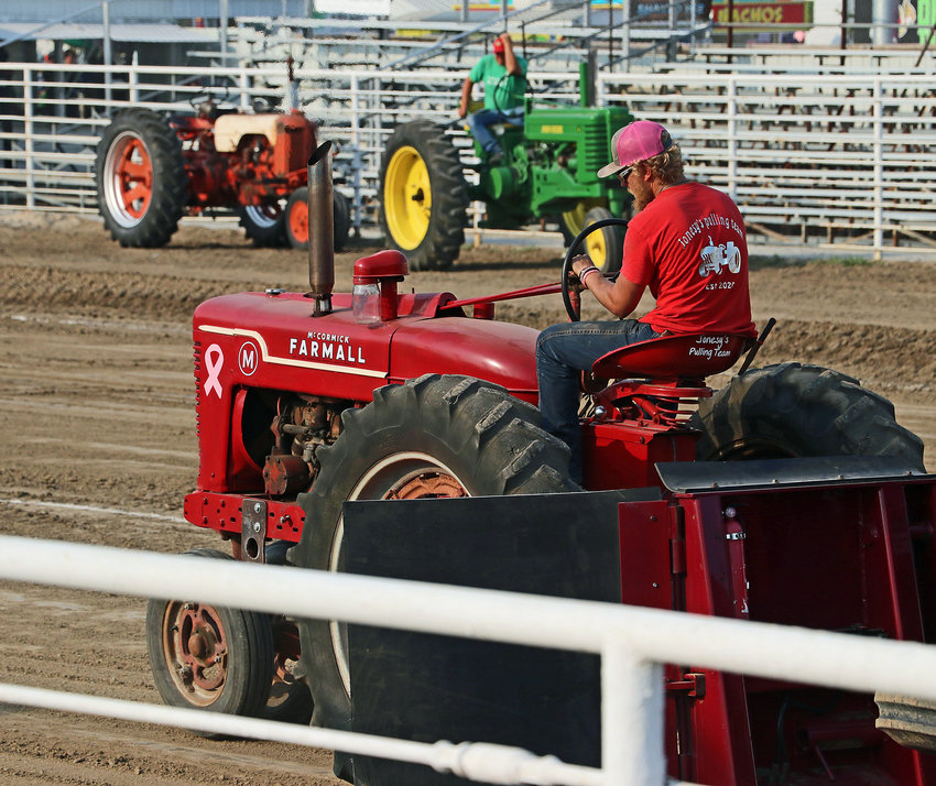 Washington County's Treyton Jones makes a pull on a Farmall H tractor Monday at the Washington County Fairgrounds.